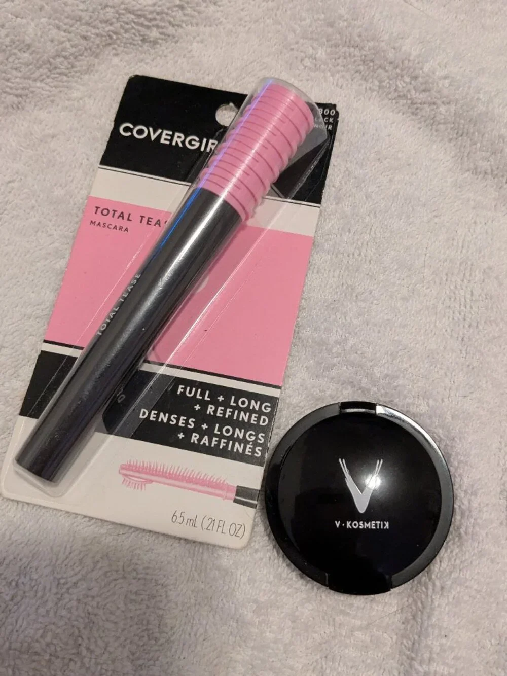 Covergirl very black mascara with V-Kosmetix translucent powder in cool neutral